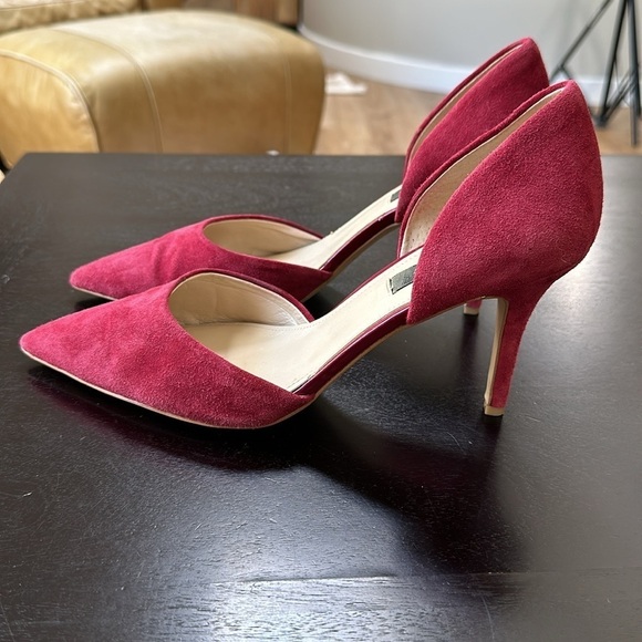 White House Black Market Shoes - Stiletto cut out suede pumps in a cranberry wine magenta shade